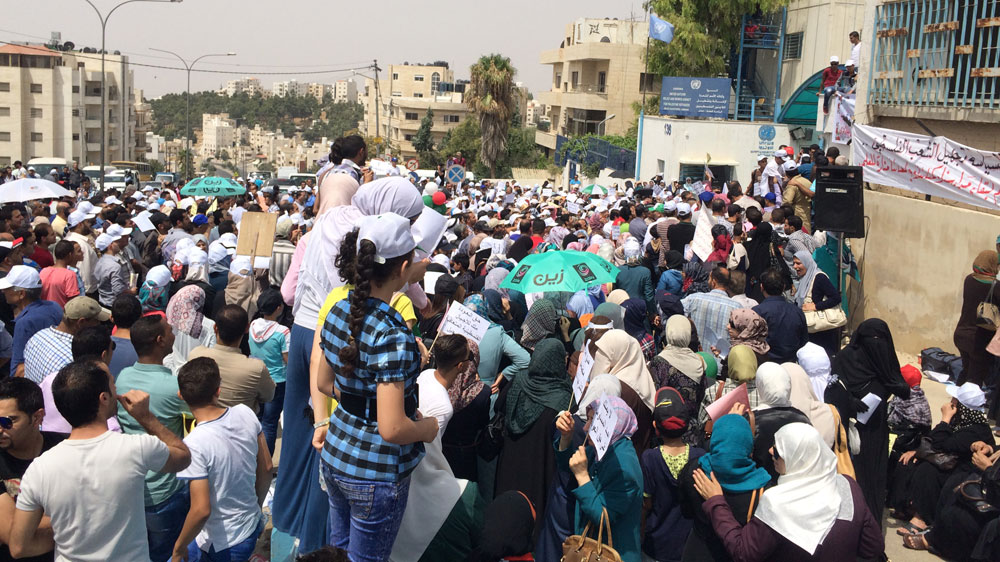 Refugees, UNRWA workers and teachers held a sit-in at UNRWA's offices in Amman on Wednesday - Nisreen El-Shamayleh/Al Jazeera