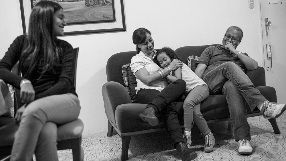 Ricardo and Corina are cautious about not revealing too much to their daughters, Ana Karina and Camila, about Ricardo's battle with cancer [Alejandro Cegarra]