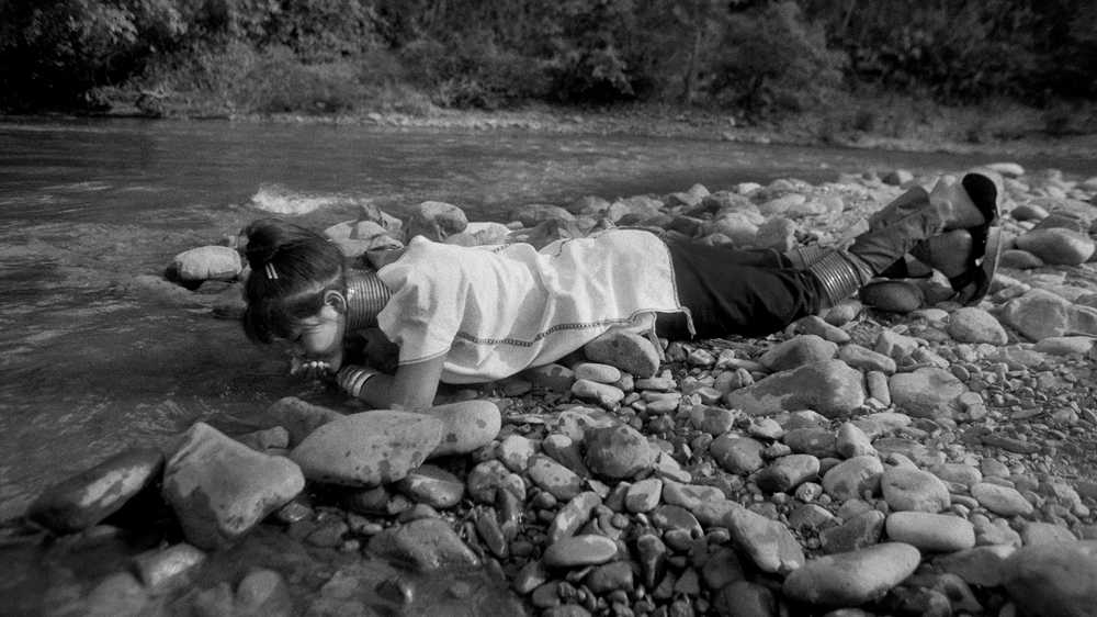 It may seem like an idyllic life to outsiders, but the Kayan people in Nai Soi village have no freedom of movement and are not allowed to leave the border village [Jack Picone]