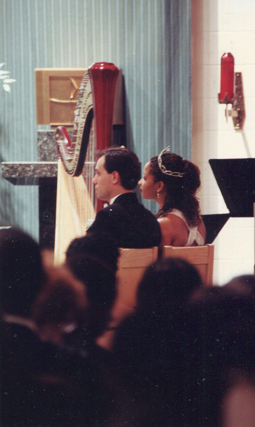 The bride sitting with her husband [Courtesy of Jacinda Townsend]