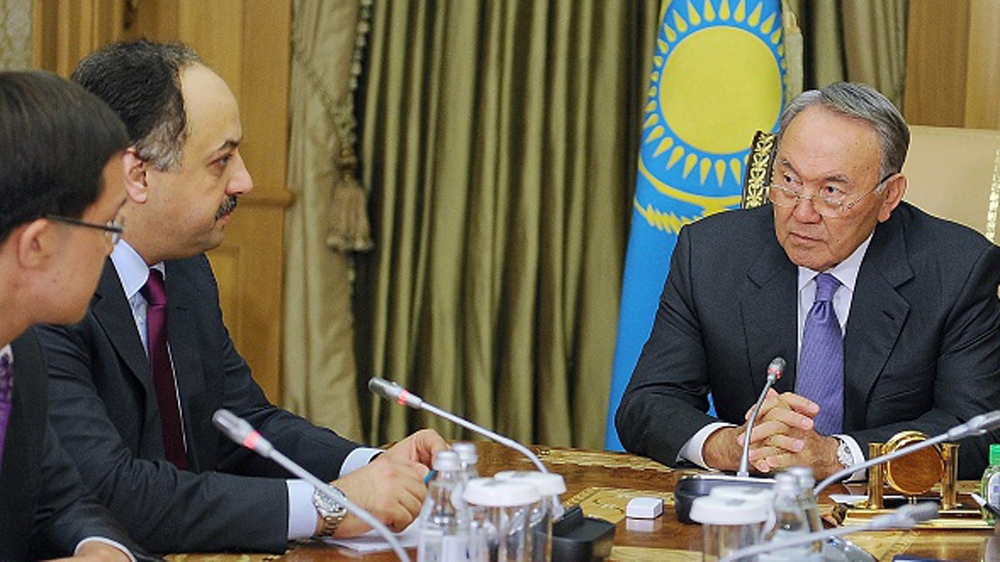 Kazakh President Nursultan Nazarbayev meets with Qatari Foreign Minister Khalid bin Mohamed al-Attiyah in Astana on June 17, 2015 [AFP]
