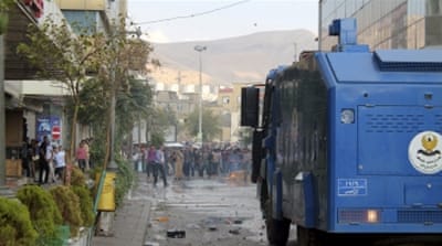 Protestors clash with riot policemen in Sulaimania, northern Iraq [REUTERS]
