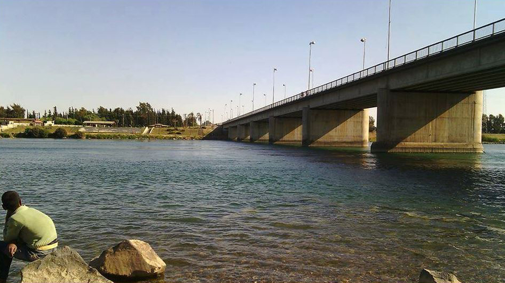 Raqqa's new bridge was partially destroyed by a Russian air strike last week [Photo via Raqqa is Being Slaughtered Silently]