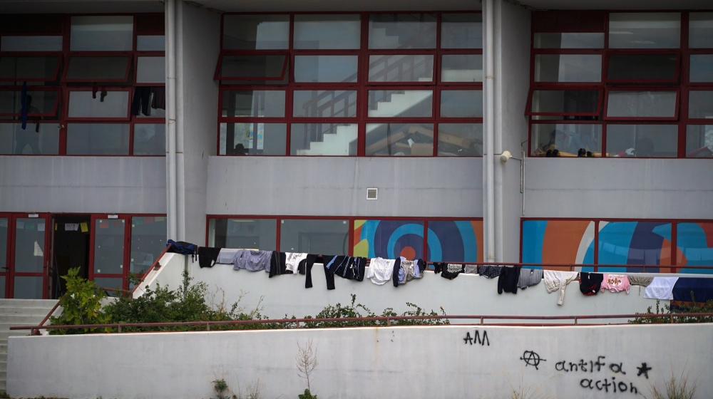 Clothes hang out to dry at the Elliniko Temporary Refugee Centre [Sorin Furcoi/Al Jazeera]