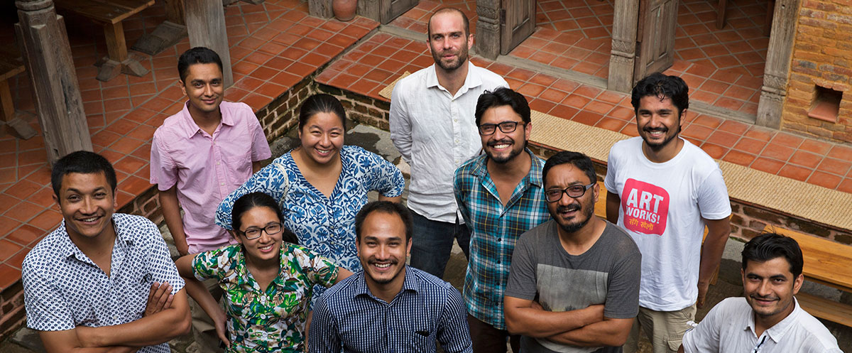 The Photo Kathmandu team with Gurung Kakshapati pictured in the middle row in blue [Photo Kathmandu]
