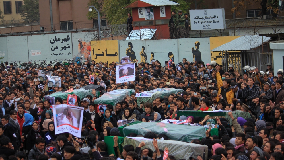 The bodies were transported from Ghazni city to Kabul marching toward the presidential palace (Maryam Mehtar/Al Jazeera English) 