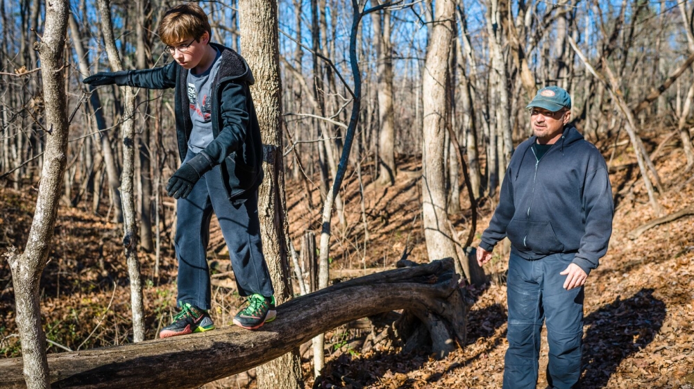 Since Garrett's mum passed away, his dad has been his sole carer. 'He's the best dad in the world,' says Garrett [Angelo Merendino/Al Jazeera]