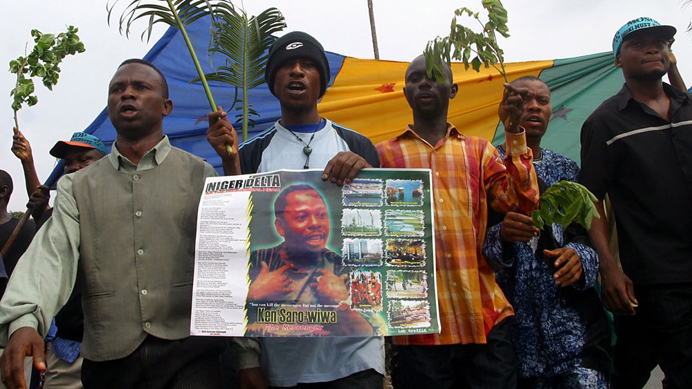 Protesters march to remember the 10th anniversary of a military junta''s execution of Ken Saro-Wiwa