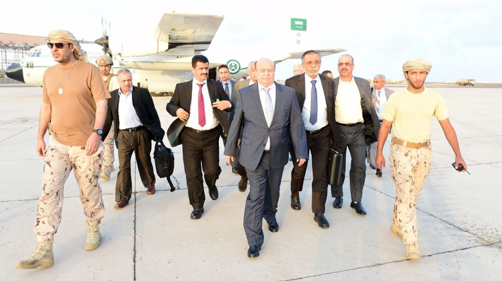 Handout photo of Yemen''s exiled President Abd-Rabbu Mansour Hadi walking at Aden airport upon his arrival from Saudi Arabia