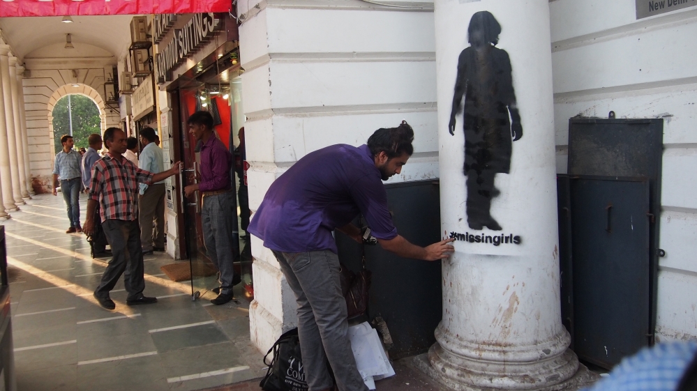 The stencilled figures on the walls serve as a reminder to young girls to be wary of stalkers [Missing Public Art Project]