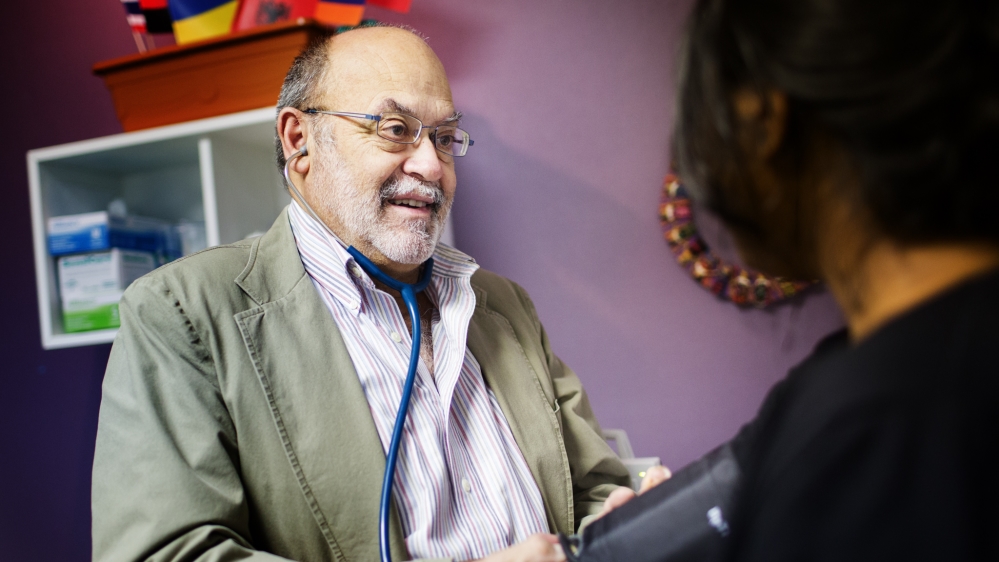 Dr Paul Caulford, the medical director and co-founder of the Canadian Centre for Refugee and Immigrant Health Care, believes the clinics are absolutely necessary [Ryan Edwardson/Al Jazeera]