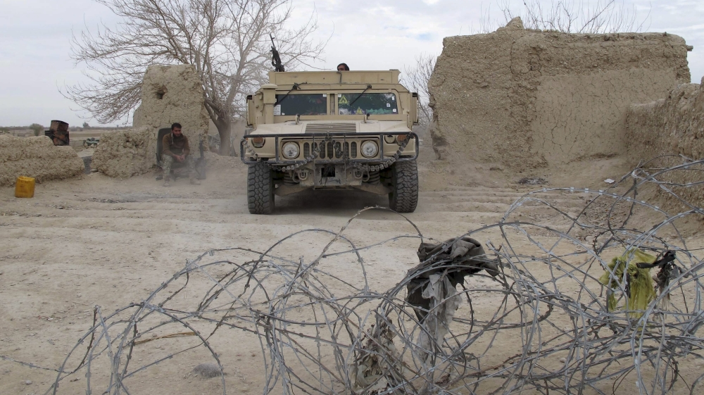 An Afghan National Army vehicle is seen parked at an outpost in Helmand province, Afghanistan