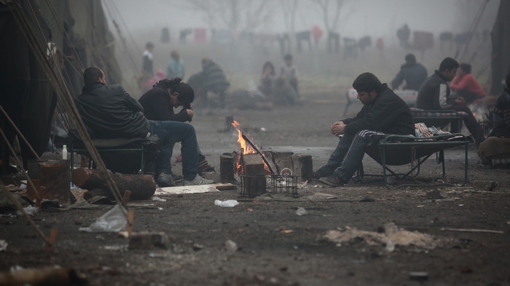 Syrian refugees try to stay warm in Bulgaria