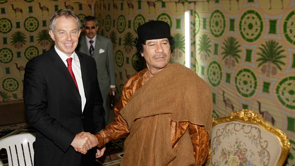 Then British Prime Minister Tony Blair, left, meets with Colonel Muammar Gaddafi on May 29, 2007, in Sirte, Libya [Peter Macdiarmid/Getty Images]