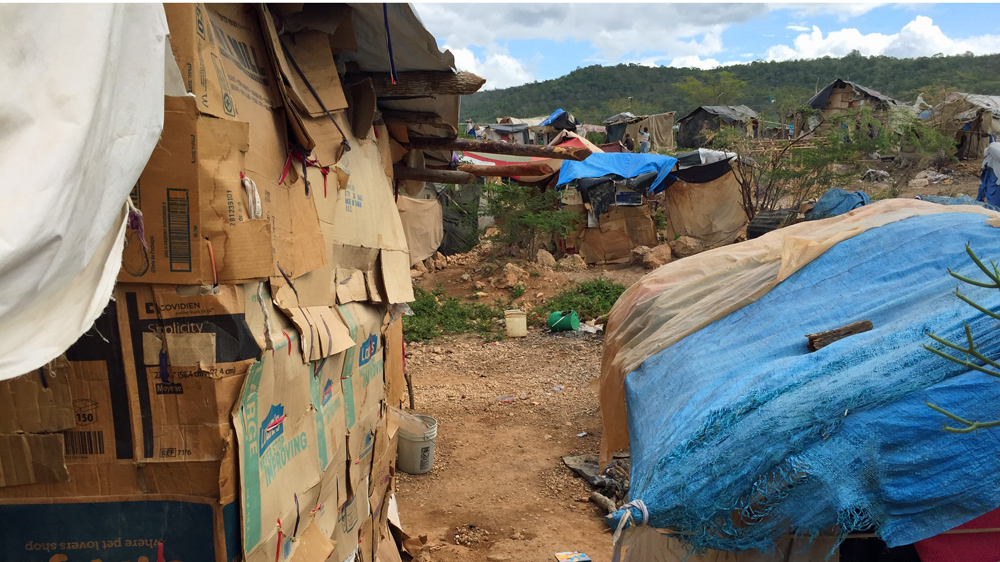 Humanitarian organisations worry for the welfare of the people living in cardboard houses on the Haiti border as the winter approaches [Matt Chandler/Al Jazeera]