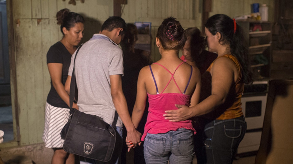 A family says goodbye as one of them prepares to leave with the smuggler [Encarni Pindado/Al Jazeera] 