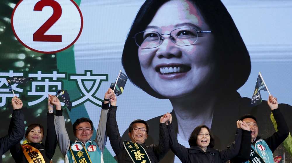 Taiwan''s DPP Chairperson and presidential candidate Tsai Ing-wen shouts slogans during a campaign rally in Taichung, Taiwan