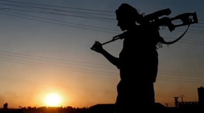 Kurdish YPG fighter [EPA]