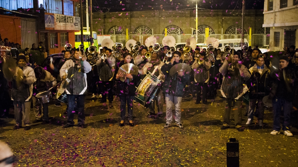 During the welcoming of the bands, the ensembles are received with parties and fireworks   [Carlos Tello/Al Jazeera]  
