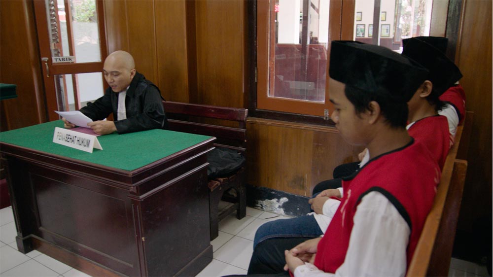 Rudhy Wedhasmara is a reformed drug user who tries to help addicts as a pro bono lawyer [Tim Deagle/Al Jazeera]