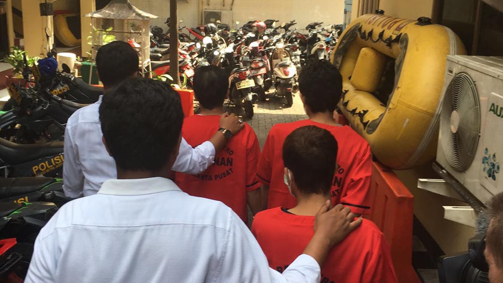 Drug dealers taken away by the authorities [Dessi Ariyanti/Al Jzeera]