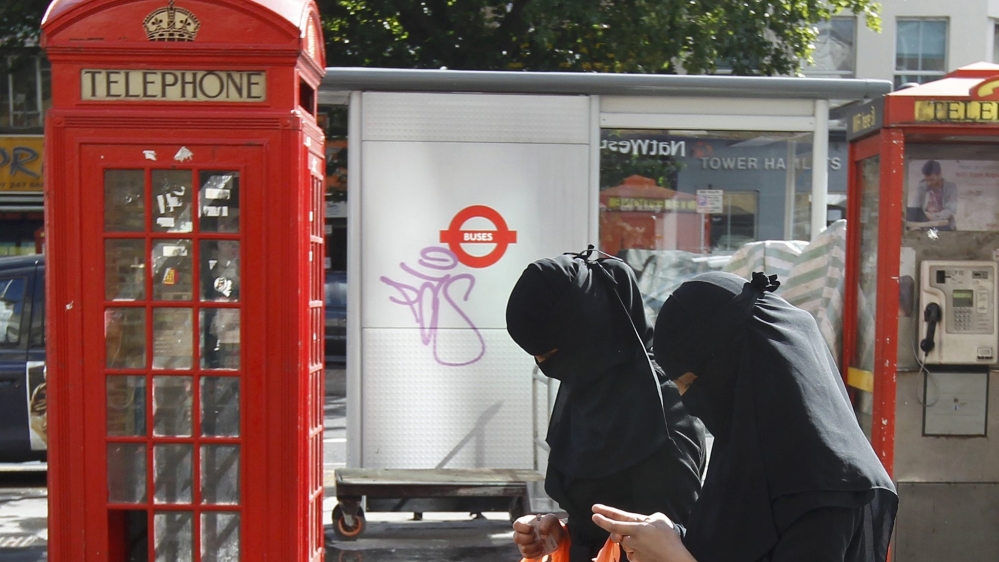 File photograph of women wearing full-face veils as they shop in London