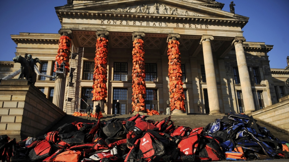 The vests were brought to Germany from the Greek island of Lesbos where they had been abandoned on beaches after being used by refugees [Stefanie Loos/Reuters]