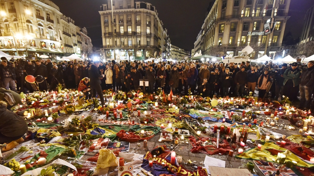 Hundreds of people come together at Place de la Bourse in Brussels to mourn [AP]