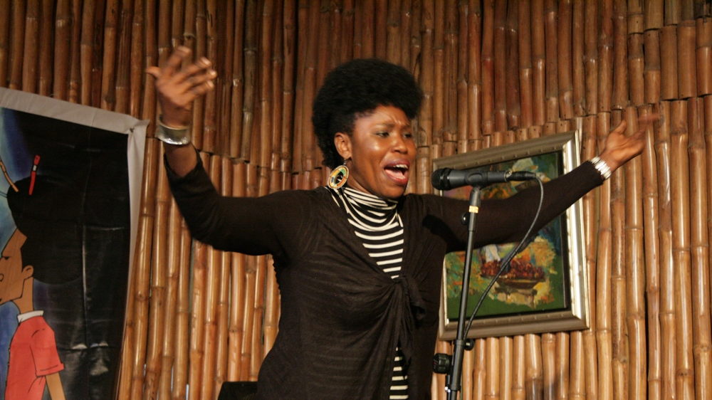 Wome Uyeye, a multitalented 'media-preneur' and poet, has been one of Oyinkansola's mentors and sees spoken word as an important platform for women [Caelainn Hogan/Al Jazeera] 