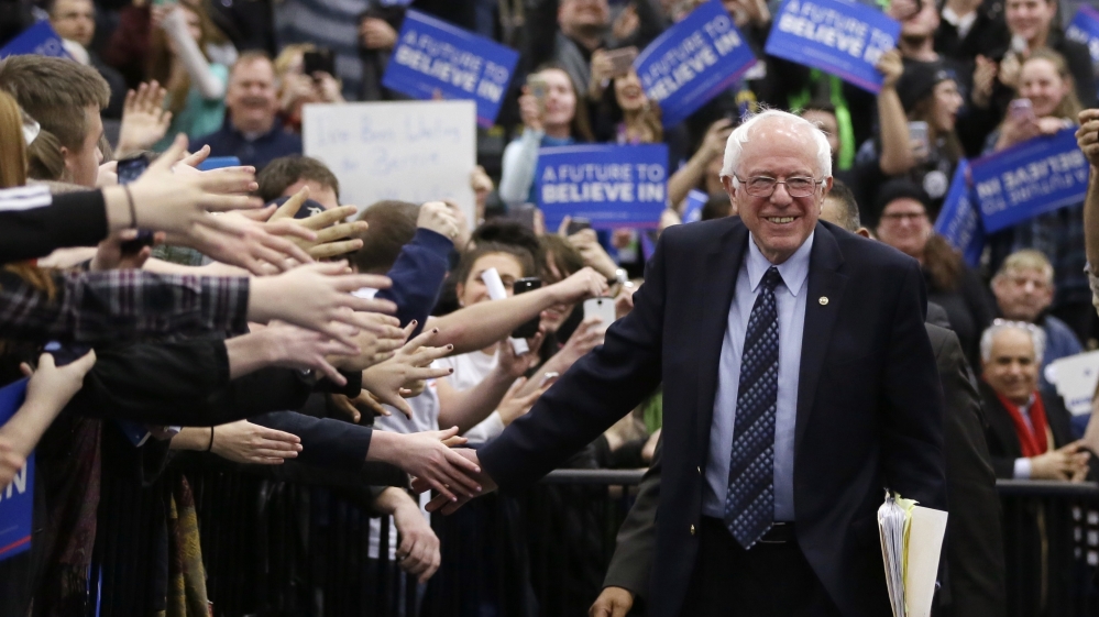 Even with his wins on Saturday, Sanders faces a tough task trying to make up the difference with Democratic frontrunner Clinton [Carlos Osorio/AP]