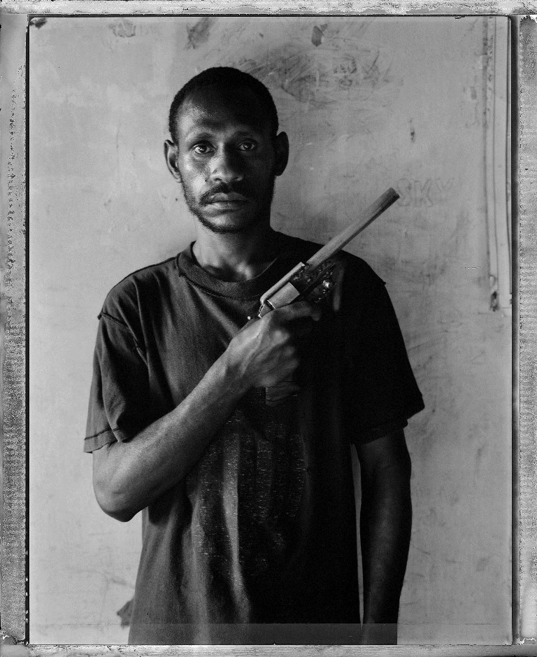 Gang member Socks in Port Moresby. 2004 [Stephen Dupont/Al Jazeera]