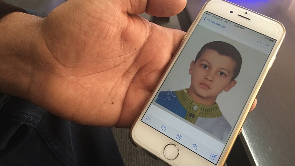 A photo of Gholam Seddiq, 9, who died at sea when the boat his family was in sank in the Mediterranean Sea [Jawad Jalali/Al Jazeera] 