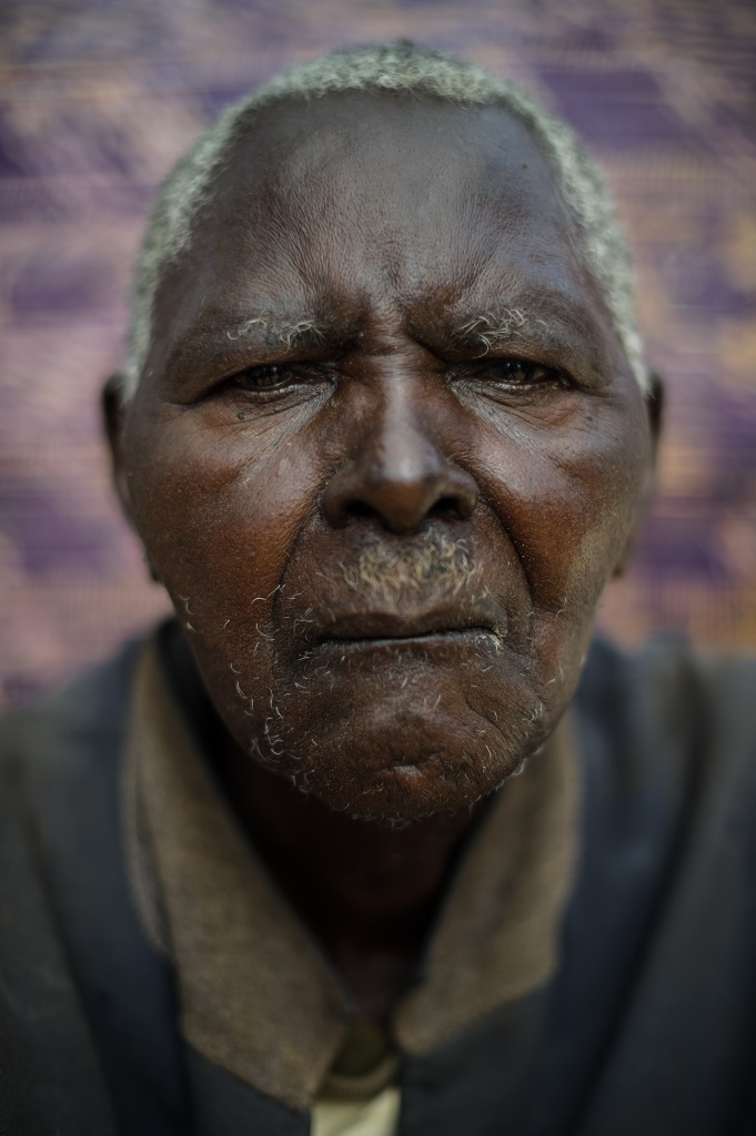 Kimweli Mbithuka Kilatya was arrested in 1952 in December. He was interrogated, beaten up and castrated  [Phil Moore/Al Jazeera]