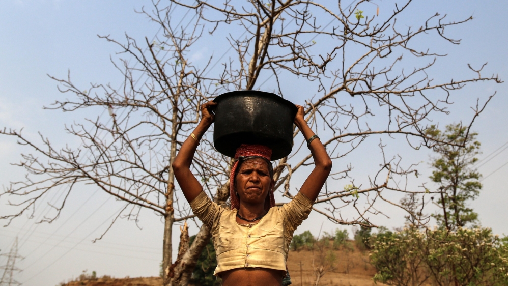 Indian Villagers looking for water source in Nasik district