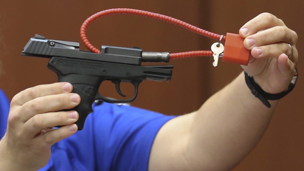 

The bidding for the gun began at $5,000, before it was removed from the site [Gary W Green/EPA]

The bidding for the gun began at $5,000, before it was removed from the site [Gary W Green/EPA]