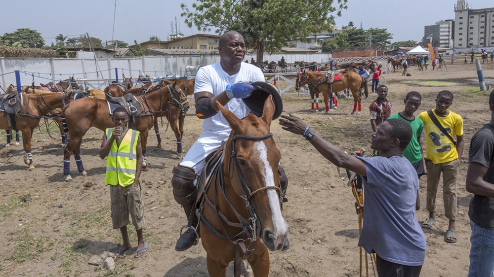 Bode Makanjuola gets ready for a match [Andrew Esiebo/Al Jazeera] 