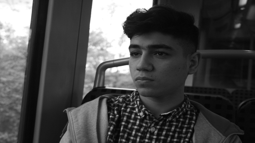 Hamouda has lived in Hamburg since October. His parents, sisters and brother are still in Aleppo [  Caelainn Hogan/Al Jazeera] 