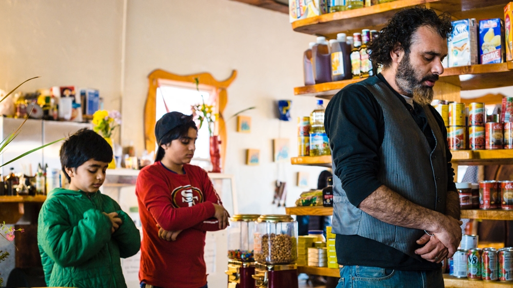 'There are parts of society that teach things that completely conflict with our beliefs, and I have to tell them that,' Ayman says of raising Muslim children [Angelo Merendino/Al Jazeera]