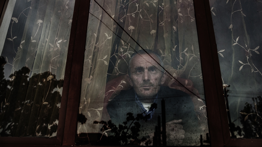 Fifty-year-old Mhili Zefi has two blood feuds hanging over him. The first he inherited from his father 20 years ago. The second began in 2009 [Carlo Gianferro/Al Jazeera] 