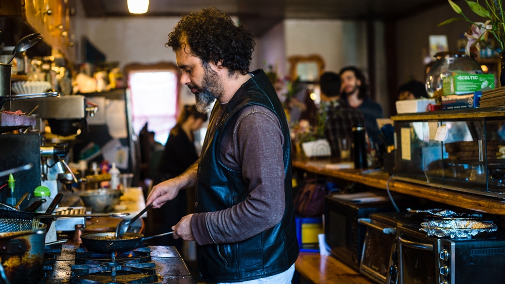 'I just have to take care of the immediate needs around me - the community and my family,' Ayman says [Angelo Merendino/Al Jazeera]