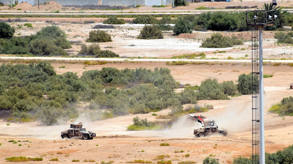 Iraqi forces trucks advance during a military operation in western Fallujah city, west of Iraq [EPA]