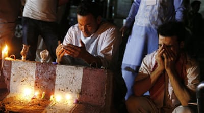 Afghans pray for the victims of a suicide bomb blast during a memorial in Kabul [JAWAD JALALI/EPA]