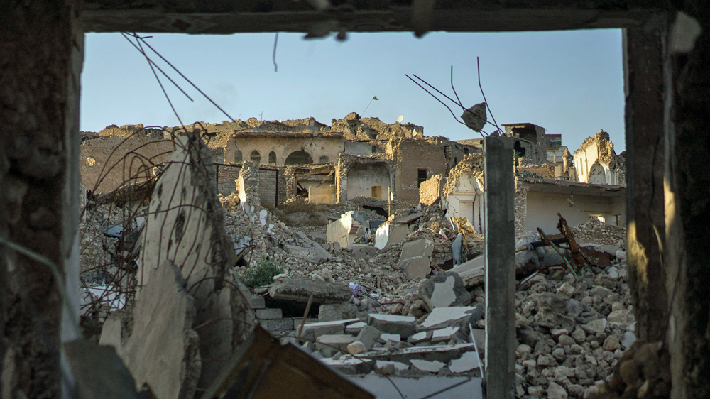 A ruined section of Sinjar's old town [John Beck/Al Jazeera]