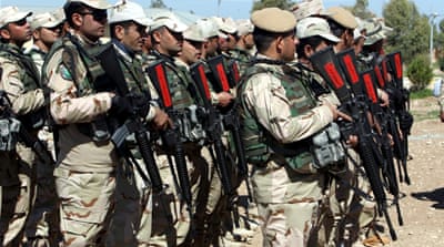 Peshmerga fighters take part in a training session with coalition forces in a training camp in Erbil, March 9 [Reuters]