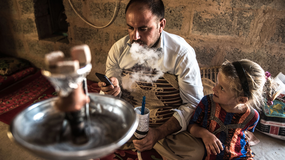 Abu Bakr Hamed says that his village was destroyed by the Shia militia who recaptured it from ISIL [Tommy Trenchard/Oxfam/Al Jazeera]