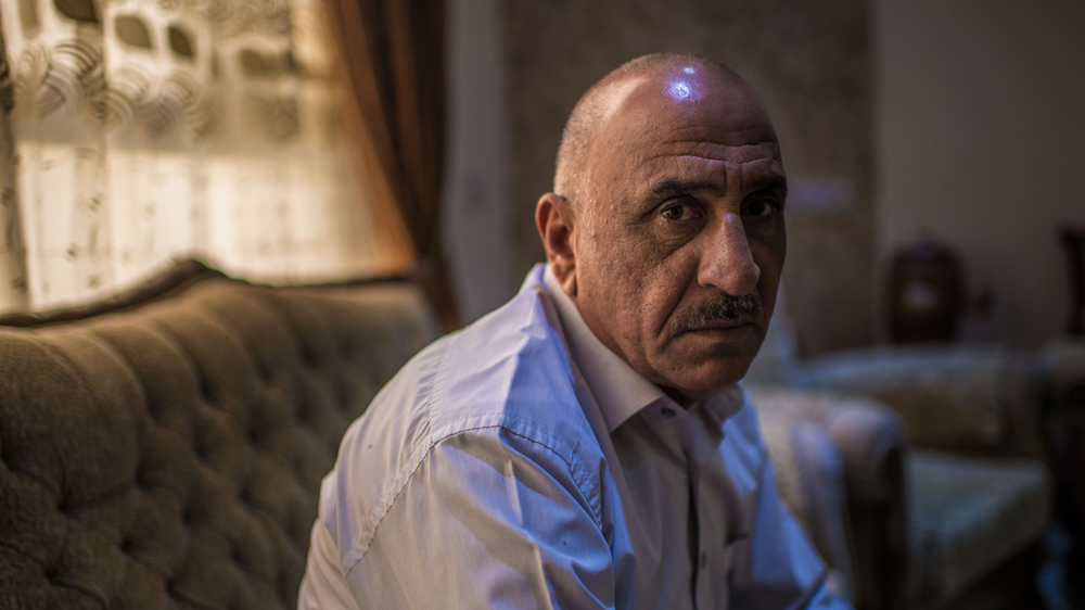 Shek Ahmed Thamer Ali, the mayor of Saadiya, has survived 11 assassination attempts [Tommy Trenchard/Oxfam/Al Jazeera]