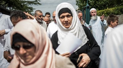Muslim worshippers leave the Yahya mosque after the midday prayer in Saint-Etienne-du-Rouvray, near Rouen, France, July 29 [EPA]