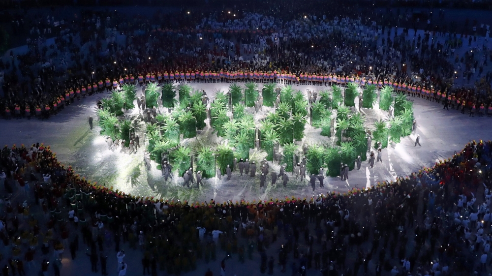 The Olympic rings were displayed in green vegetation [Fabrizio Bensch/Reuters]