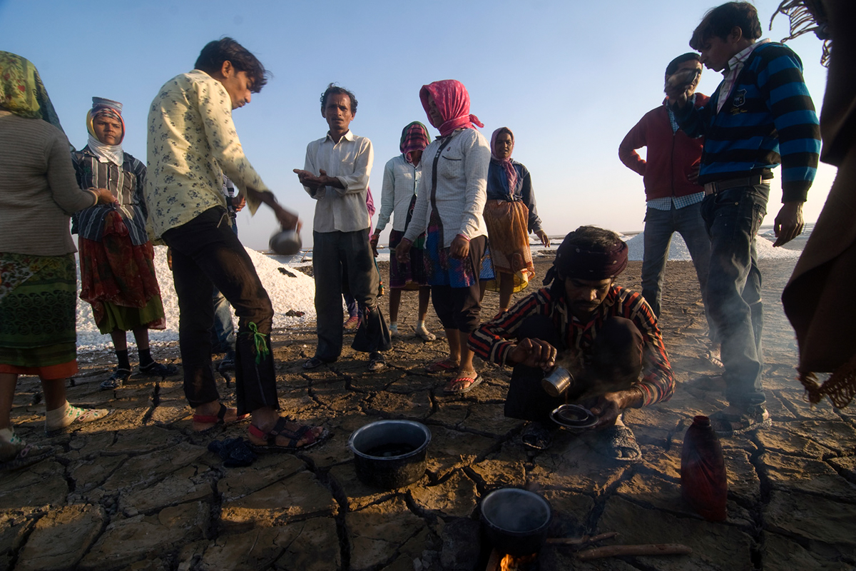 A short tea break during the daily 10-hour schedule, which runs from 7am till 5pm. The salt workers produce an average of 12-15 tonnes of salt every 15 days from each of these salt pans. The salt is s