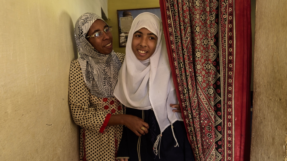 Shabana Jan, left, who is photographed with her daughter Aina in their Santa Clara home, converted to Islam shortly after her husband embraced the religion [Carlo Bevilacqua/Parallelozero]